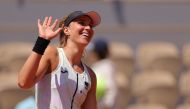 Brazil's Beatriz Haddad Maia waves as she celebrates her victory over Tunisia's Ons Jabeur on day eleven of the Roland-Garros Open tennis tournament at the Court Philippe-Chatrier in Paris on June 7, 2023. (Photo by Thomas Samson / AFP)