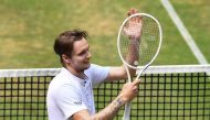Kazakhstan's Alexander Bublik celebrates winning against Germany's Alexander Zverev during the men's singles semi-final tennis match of the ATP 500 Halle Open tennis tournament in Halle, western Germany, on June 24, 2023. (Photo by Carmen Jaspersen / AFP)