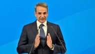 Greek ex-prime minister Kyriakos Mitsotakis, and leader of the New Democracy party, gives his speech after clinching a landslide victory in the second round of the general elections, at the party headquarters in Athens on June 25, 2023. (Photo by Louisa Gouliamaki / AFP)