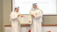 QRCS officials with the accreditation certificate during the event.