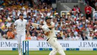 Australia's David Warner watches the ball after playing a shot for six runs to take him to 52 runs, on day one of the second Ashes cricket Test match between England and Australia at Lord's cricket ground in London, on June 28, 2023. (Photo by Ian Kington / AFP)
