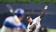 Blake Snell #4 of the San Diego Padres pitches during the first inning of a baseball game against the New York Mets at Petco Park on July 8, 2023 in San Diego, California. (Photo by DENIS POROY / GETTY IMAGES NORTH AMERICA / Getty Images via AFP)
