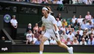 Russia's Andrey Rublev celebrates winning a point against Kazakhstan's Alexander Bublik during their men's singles tennis match on the seventh day of the 2023 Wimbledon Championships at The All England Tennis Club in Wimbledon, southwest London, on July 9, 2023. (Photo by Daniel LEAL / AFP)