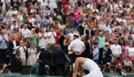 Czech Republic's Marketa Vondrousova celebrates winning against Tunisia's Ons Jabeur at the end of their women's singles final tennis match on the thirteenth day of the 2023 Wimbledon Championships at The All England Lawn Tennis Club in Wimbledon, southwest London, on July 15, 2023. (Photo by Adrian DENNIS / AFP)
