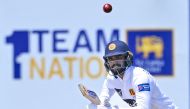Sri Lanka's Dhananjaya de Silva runs between the wickets during the second day of the first cricket Test match between Sri Lanka and Pakistan at the Galle International Cricket Stadium in Galle on July 17, 2023. (Photo by Ishara S. Kodikara / AFP)