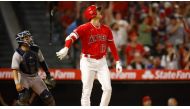 Shohei Ohtani #17 of the Los Angeles Angels after hitting a two-run home run against the New York Yankees in the seventh inning at Angel Stadium of Anaheim on July 17, 2023 in Anaheim, California. (Photo by RONALD MARTINEZ / GETTY IMAGES NORTH AMERICA / Getty Images via AFP)

