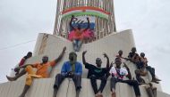 Supporters of the Nigerien defence and security forces gather during a demonstration outside the national assembly in Niamey on July 27, 2023. (Photo by AFP)