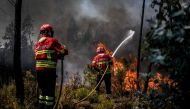 Firefighters battle a wildfire in Carrascal, Proenca a Nova on August 6, 2023. Photo by Patricia DE MELO MOREIRA / AFP