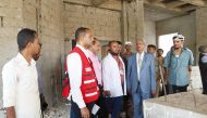 Officials visiting an under construction project for building a dialysis centre by QRCS in Lahij Governorate of Yemen.