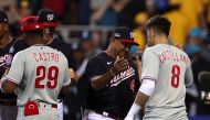 Manager Dave Martinez #4 of the Washington Nationals shakes hands with Nick Castellanos #8 of the Philadelphia Phillies following the Nationals 4-3 win during the 2023 Little League Classic at Bowman Field on August 20, 2023 in South Williamsport, Pennsylvania. (Photo by Rob Carr / GETTY IMAGES NORTH AMERICA / Getty Images via AFP)
