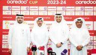Ooredoo and QSL officials during the agreement signing ceremony.