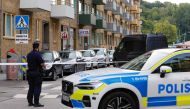 Police is seen at the site of an explosion in Olskroken in Gothenburg, Sweden, August 31, 2023. (Photo by Adam IHSE / TT News Agency / AFP) 