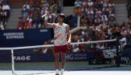 Carlos Alcaraz of Spain reacts against Daniel Evans of Great Britain during their Men's Singles Third Round match. CLIVE BRUNSKILL /Getty Images via AFP

