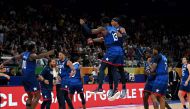 US's players react during the FIBA basketball World Cup quarter-final match between US and Italy in Manila on September 5, 2023. (Photo by Jam Sta Rosa / AFP)

