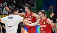 Team Germany celebrates their victory during the FIBA Basketball World Cup semi-final match between USA and Germany in Manila on September 8, 2023. (Photo by Jam Sta Rosa / AFP)