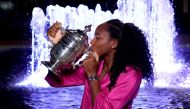 Coco Gauff of the United States poses outside of Arthur Ashe Stadium. on September 09, 2023. Elsa/Getty Images/AFP (Photo by ELSA /AFP)

