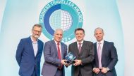 Qatar Airways officials receiving the award.