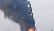 This picture taken on September 17, 2023 shows a raging fire at the Greater Nile Petroleum Oil Company Tower in Khartoum. Battles between the regular army and the paramilitary Rapid Support Forces, which intensified on September 17, had set fire to several key buildings in the centre of Sudan's capital. (Photo by AFP)

