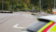 A destroyed street is seen near Stenungsund, Sweden, on September 23, 2023. (Photo by Adam IHSE / TT News Agency / AFP)