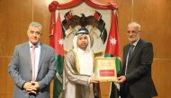 Katara General Manager, Prof. Dr. Khalid bin Ibrahim Al Sulaiti receiving a token of appreciation from the Union of Jordanian Publishers.
