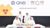 Minister of Municipality, H E Dr. Abdullah bin Abdulaziz bin Turki Al Subaie and QNB GCEO, Abdulla Mubarak Al Khalifa witnessing signing of agreement by QNB Group Chief Operating Officer, Ali Rashid Al Mohannadi; Expo 2023 Doha Qatar Secretary General, Mohamed Ali Al Khoury.
