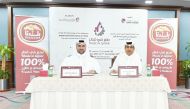 General Manager of Qatar Chamber and Chairperson of the Exhibition’s Technical Committee, Saleh bin Hamad al Sharqi, and Chief Corporate Services Officer of Baladna Nasser Ali Al Maslamani, during the signing ceremony.