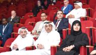 Minister of Labour H E Dr. Ali bin Smaikh Al Marri (centre), President of Qatar University H E Dr. Omar Al Ansari (left), QU Vice-President for Research and Graduate Studies Dr. Maryam Al Maadeed, and others at the seminar.