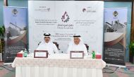 Director of Administrative and Finance Affairs Department at Qatar Chamber Hussain Yosef Al Abdulghani and Administration Director at Al-Awalia Mohammed Abubaker Al-Mahmoud during the agreement signing.