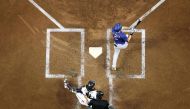 Corey Seager #5 of the Texas Rangers hits a home run in the third inning against the Arizona Diamondbacks during Game Three of the World Series at Chase Field on October 30, 2023 in Phoenix, Arizona. (Photo by Christian Petersen / GETTY IMAGES NORTH AMERICA / Getty Images via AFP)
