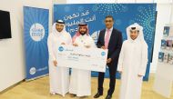 Saleh Hamad Al-Marri receives prize on behalf of his mother Latifa Abdulhadi Al-Marri in presence of QIB’s General Manager – Personal Banking Group, D Anand and other officials.