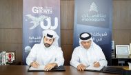 Chairman and Managing Director of Qetaifan Projects Sheikh Nasser bin Abdulrahman Al Thani and Monaqasat representative and board member Abdelaziz Al Tamimi signing the agreement.