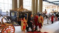 South Korea's President Yoon Suk Yeol arrives in the ceremonial State Carriage at Buckingham Palace in central London on November 21, 2023, on the first day of a three-day state visit to the UK. (Photo by Daniel Leal / POOL / AFP)