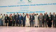 Minister of Labour H E Dr. Ali bin Smaikh Al Marri (seventh right) and other delegates at the opening of the fifth Islamic Conference of Labour Ministers, in Baku, Azerbaijan.
