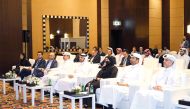 Assistant Undersecretary of National Manpower Affairs in the private sector at the Ministry of Labour, Sheikha Al Badi and CEO of Invest Qatar, Sheikh Ali Alwaleed Al Thani with other officials during the event. 