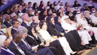 H H Sheikha Moza bint Nasser, Chairperson of the Education Above All Foundation, along with other dignitaries and participants during the plenary session on education. 