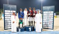 The podium winners of the Big Tour pose for a photograph with officials. 
