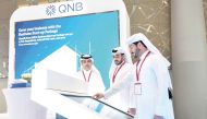 Officials at QNB booth during the ninth edition of the Made in Qatar exhibition.