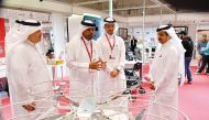 Chairman of Qatar Chamber Sheikh Khalifa bin Jassim Al Thani with other officials during the exhibition tour.
