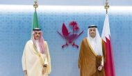 Prime Minister and Minister of Foreign Affairs H E Sheikh Mohammed bin Abdulrahman bin Jassim Al Thani with  Minister of Foreign Affairs of the Kingdom of Saudi Arabia H H Prince Faisal bin Farhan bin Abdullah Al Saud in Doha yesterday.