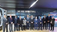 Officials of FIBA and QOC delegation pose for a group photo on the sidelines of the meeting. 