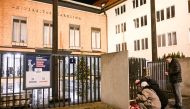 Well wishers light candles for the shooting victims at the Charles University main office in central Prague, on December 21, 2023. Photo by Michal CIZEK / AFP