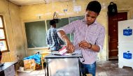 A voter casts his vote at a polling station in Goma, Democratic Republic of the Congo (DRC), Dec. 20, 2023. (Str/Xinhua)
