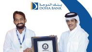 Doha Bank Group CEO Sheikh Abdulrahman bin Fahad bin Faisal Al Thani (right) and Shakeer Cheerayi with the award.
