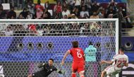 UAE Sultan Adil (right) scores a goal against Hong Kong, yesterday. AFP