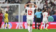 Lebanon's defender #12 Robert Melki reacts after a missed chance during the AFC Qatar 2023 Asian Cup Group A football match between Qatar and Lebanon at the Lusail Stadium in Lusail, north of Doha on January 12, 2024. (Photo by HECTOR RETAMAL / AFP)