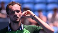 Russia's Daniil Medvedev reacts after a point against France's Terence Atmane during their men's singles match on day two of the Australian Open tennis tournament in Melbourne on January 15, 2024. (Photo by WILLIAM WEST / AFP) 