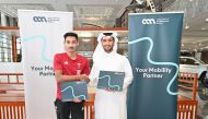 Al Abdulghani Motors CEO Abdulghani Nasser Al Abdulghani with Qatar para athlete Ali Radi Arshid during the ceremony.