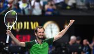 Russia's Daniil Medvedev celebrates victory against Poland's Hubert Hurkacz during their men's singles quarter-final match on day 11 of the Australian Open tennis tournament in Melbourne on January 24, 2024. (Photo by Paul Crock / AFP)