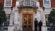 Police officers stand guard outside the London Clinic in London on January 26, 2024. (Photo by Daniel LEAL / AFP)
