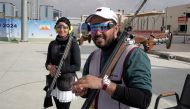  Reem Al Sharshani and Rashid Saleh Al Athba.